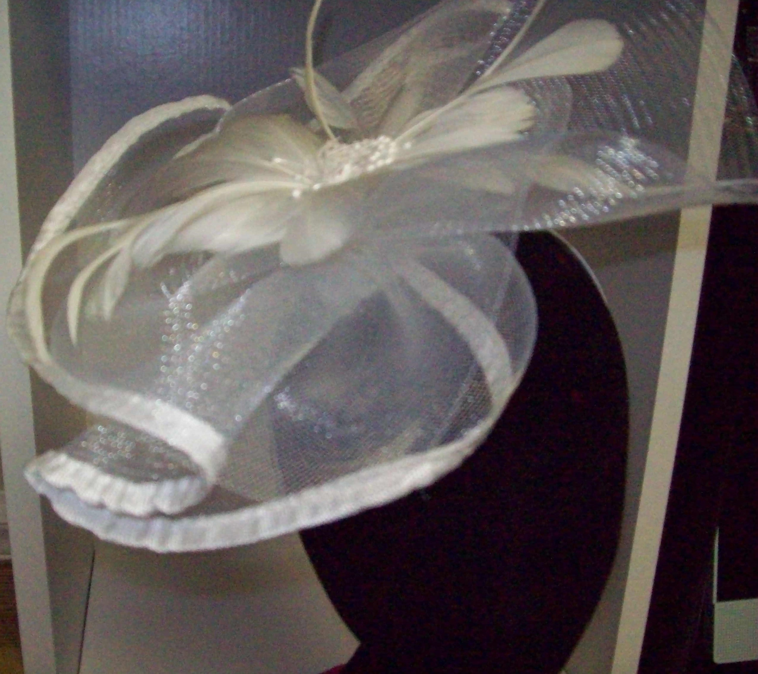 HC devine white fascinator