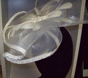 HC devine white fascinator